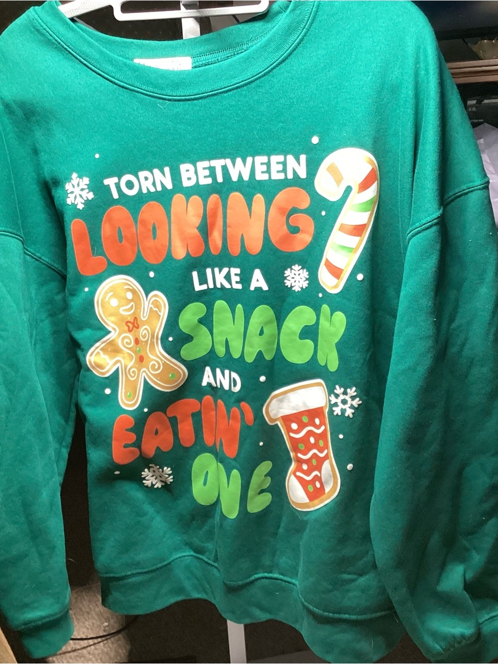 Wound Up Green Holiday Graphic Sweatshirt with Red, Orange, and Lime Accents